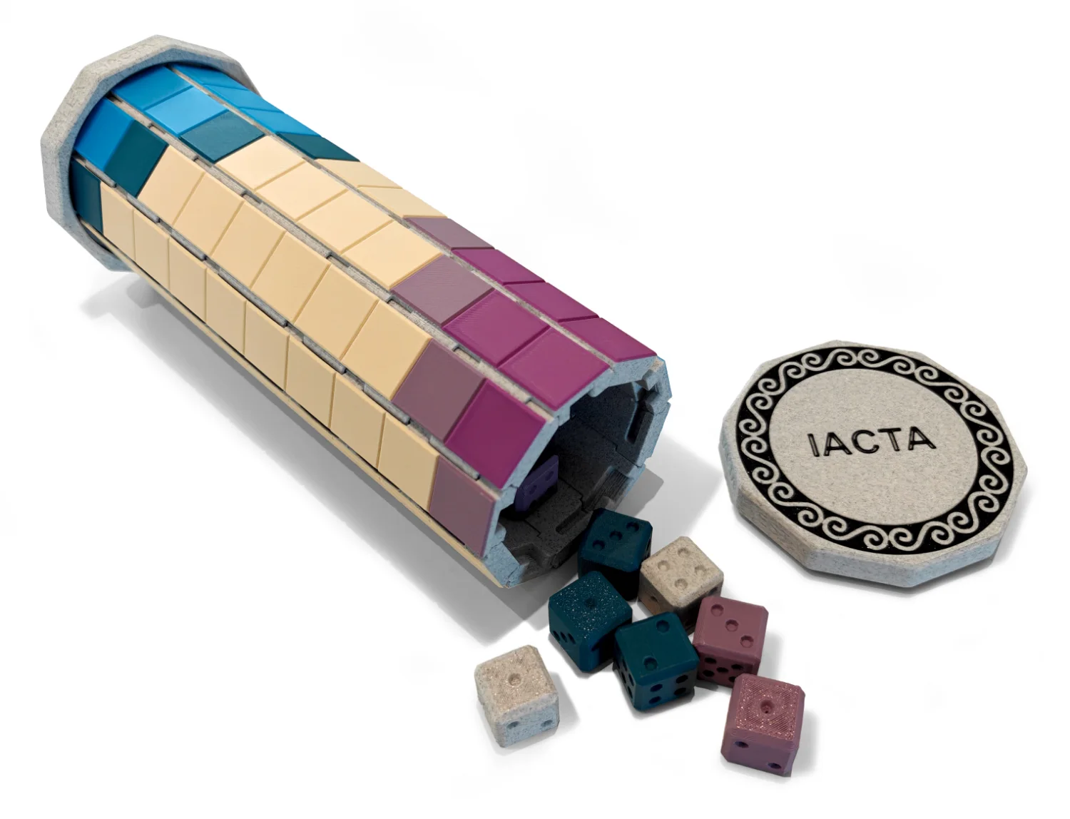 The Iacta board rolled up into a case that stores the dice inside